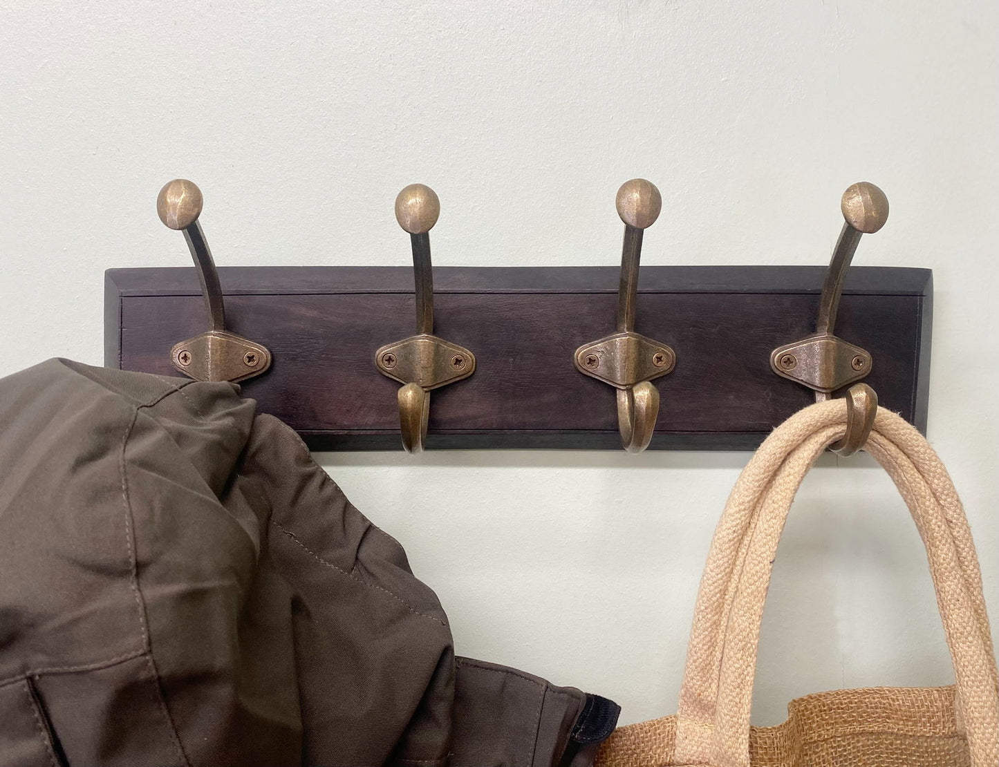 Wooden Base With 4 Brass Coat Hooks